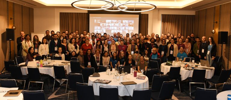 Attendees of the SSI Collaborations Workshop 2023 gathered in the event space