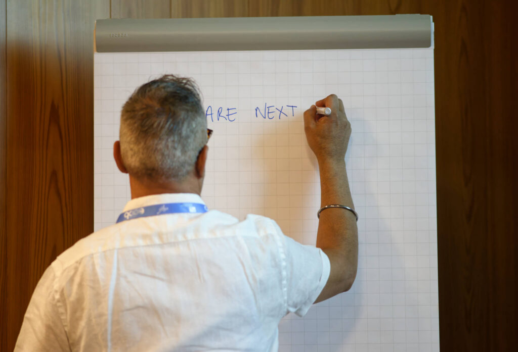 Nick Juty writing on whiteboard